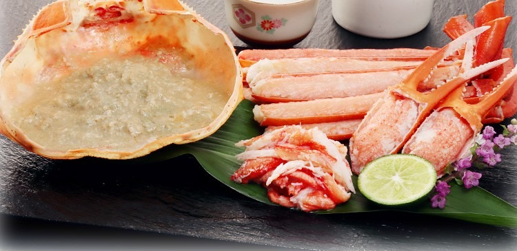 甲羅に入ったカニ味噌と、紅ずわいの脚の身