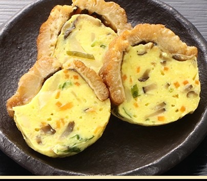 玉子の生地を穴子で巻いて蒸した料理